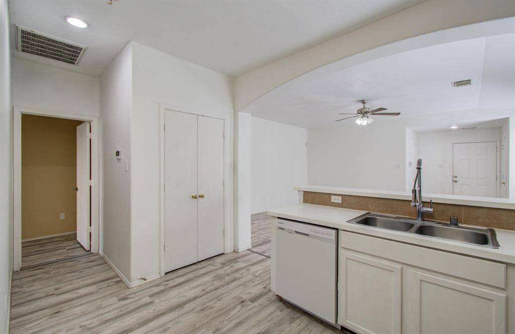 Kitchen and primary bedroom is separated from additional bedrooms