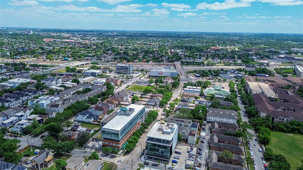 A broader angle reveals the home's seamless connection to the wider cityscape—underscoring the balance of tranquility and access that defines its exceptional location.