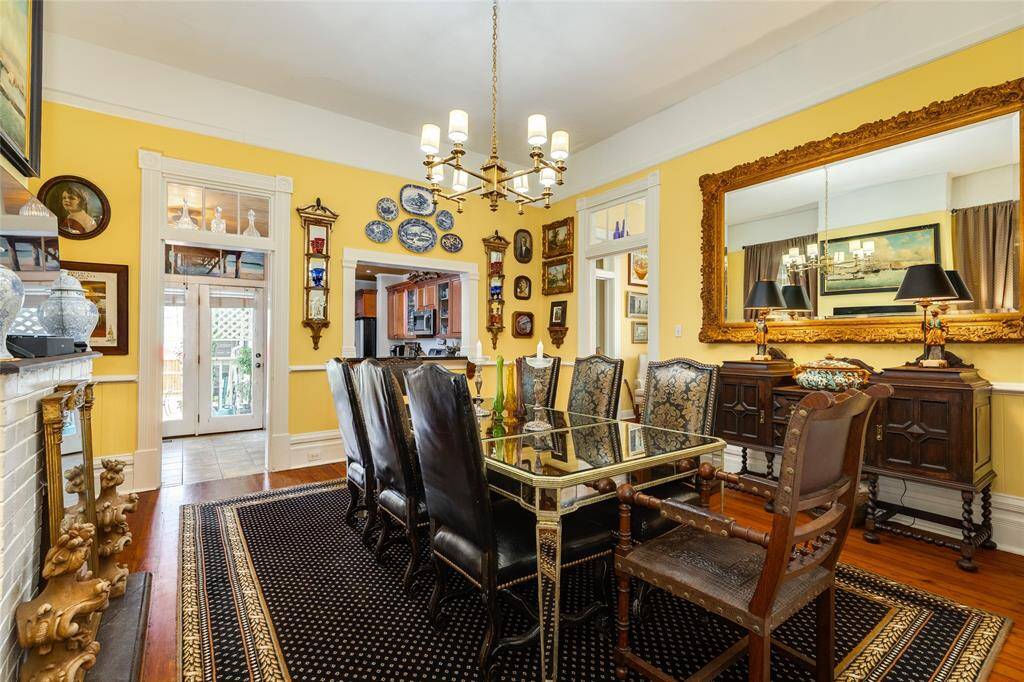 Dining space that flows into the kitchen and exit to back yard.