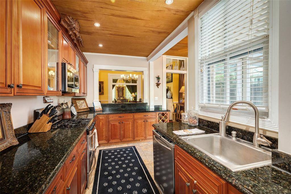 Large kitchen that is great for preparing meals and entertaining. Has wine storage area.