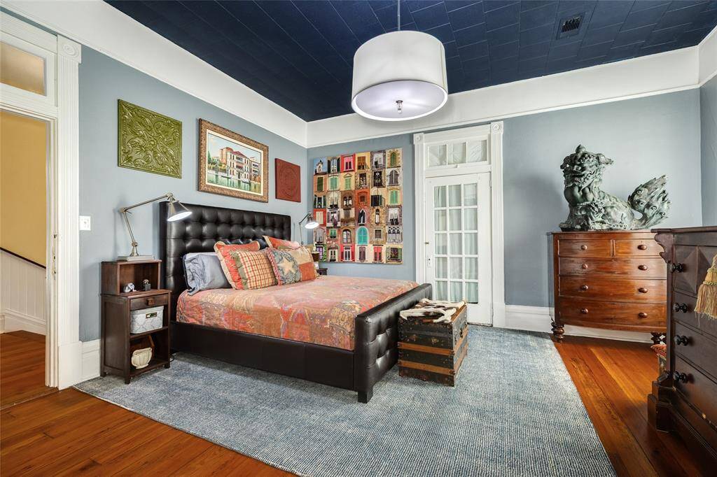 Large 17x17 Bedroom currently used as Primary Bedroom with door leading to front bedroom.