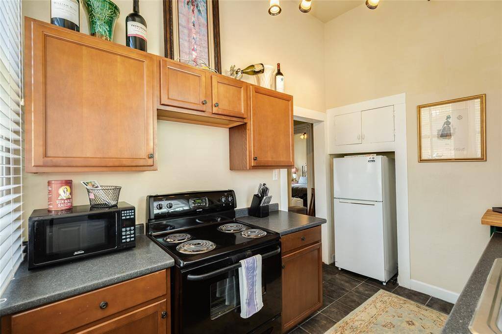 Secondary ground level back kitchen that connects to the back bedroom.