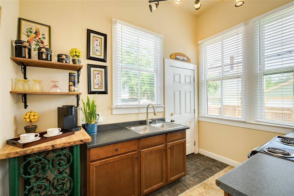 Ground level Full kitchen to guest suite showing entrance to quarters.