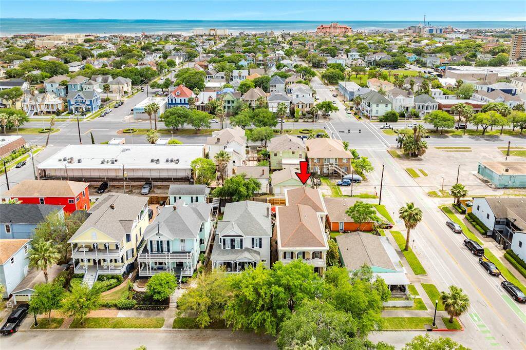 Aerial view of home showing proximity to the Beach.  Home has boxed gutters.