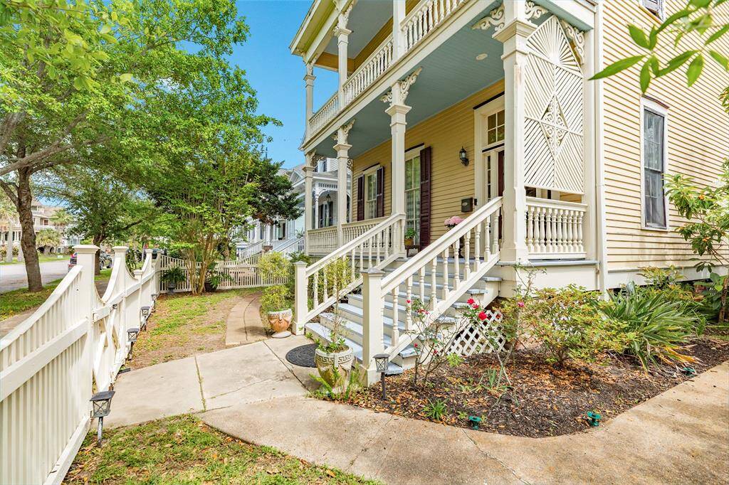 Architectural detail throughout exterior and interior of home.   Inviting front yard.