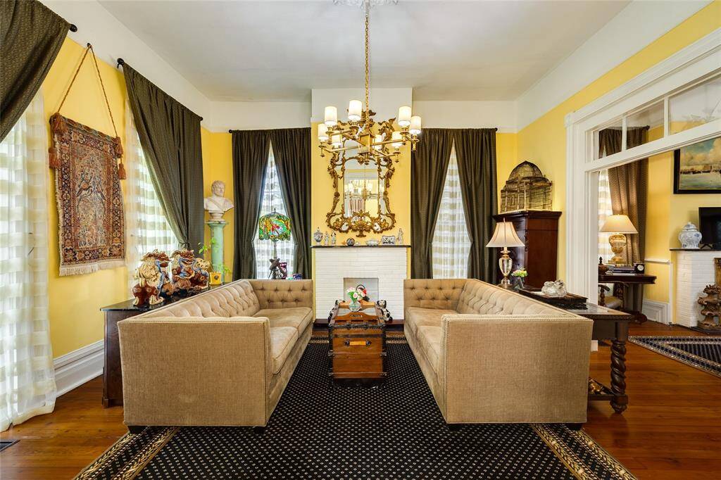 Spacious 17x17 living space with Chandelier that was in the Historic Hotel in Galveston.  Ornate fireplace with gas connections.