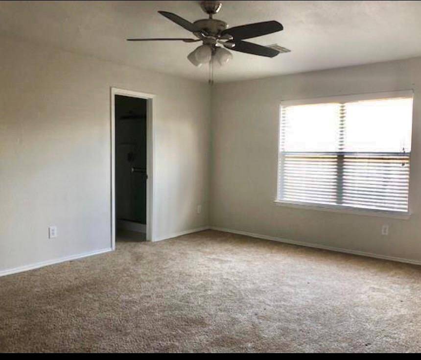 Primary bedroom is large enough for a king size bed.