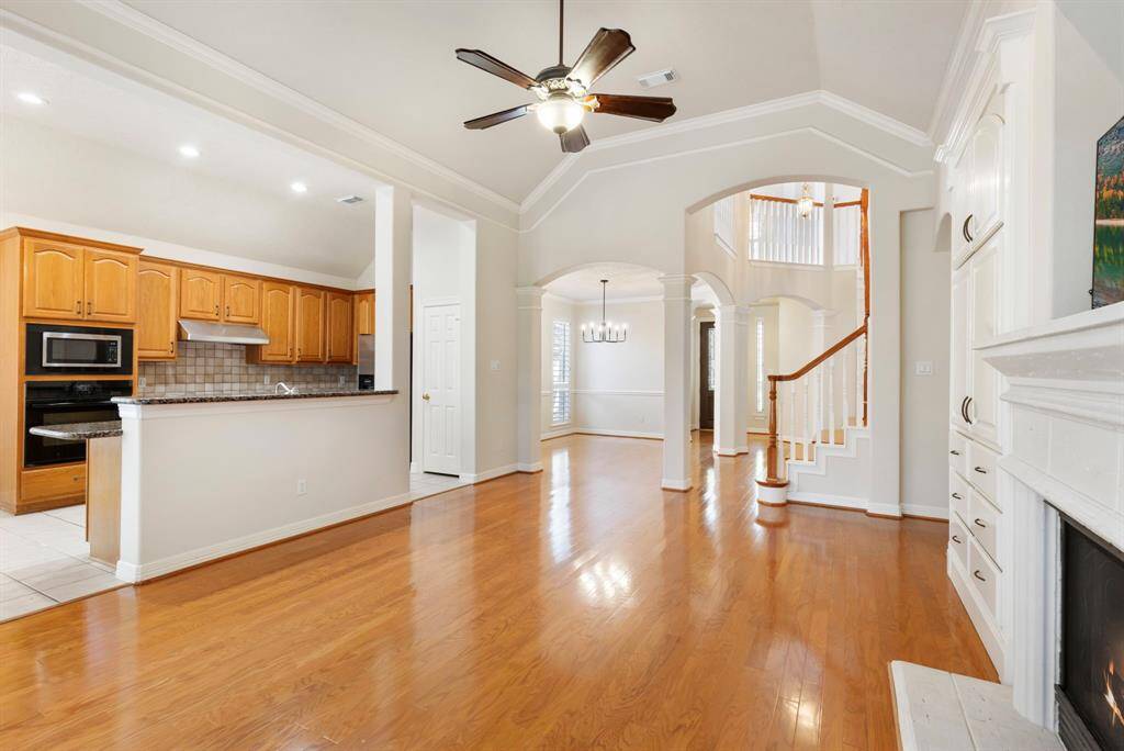The dining room leads to the kitchen which conveniently opens to the den.
