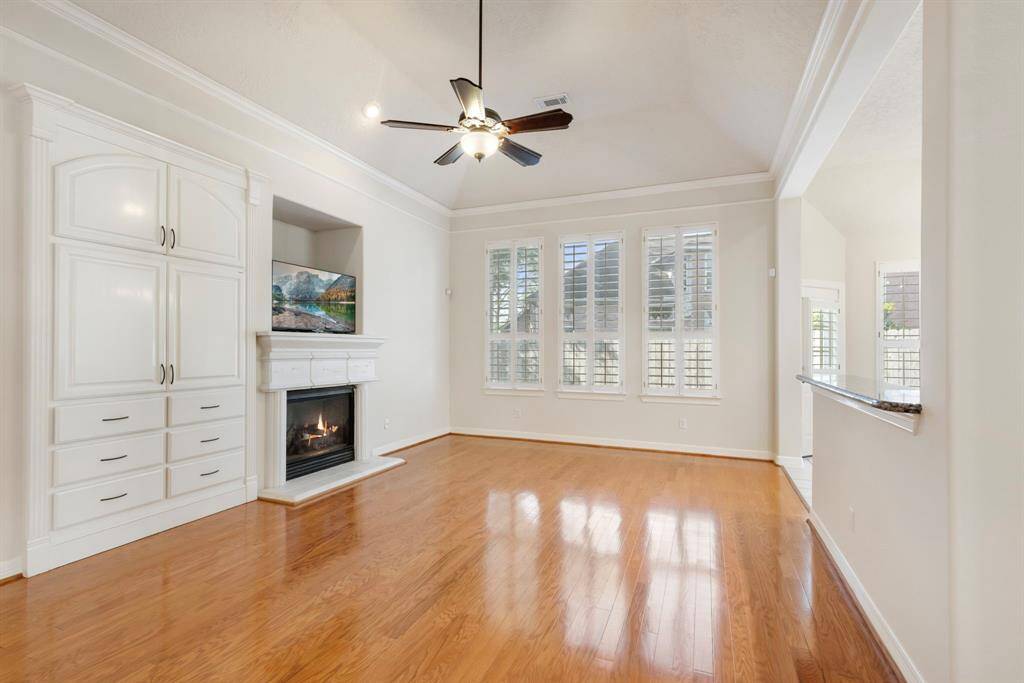 Warming fireplace creates a lovely ambience and the built-in storage is aesthetic and useful as it provides extra storage.