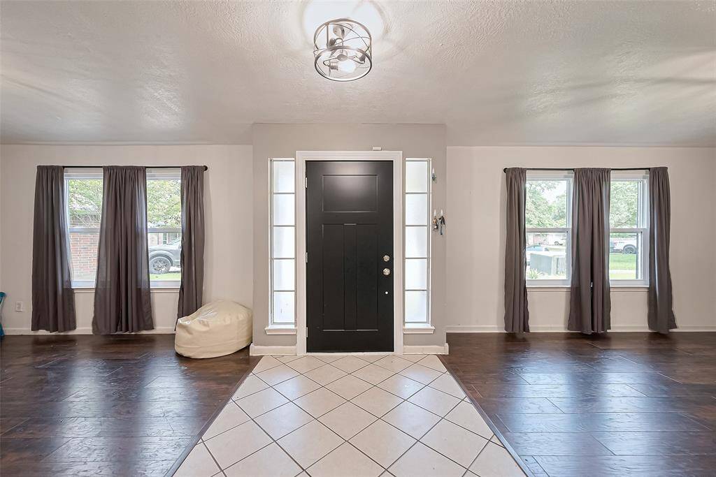 Foyer looking back at front door - Study or living area on the left , Dining Room on the right