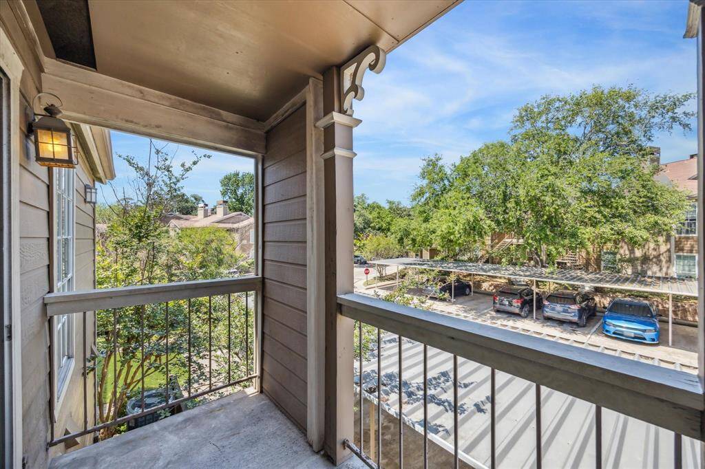 The covered balcony provides a nice outdoor space.