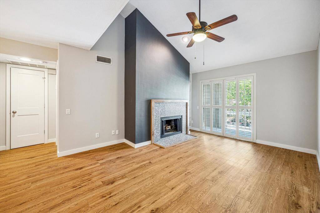 Additional features include: plantation shutters, stylish light fixtures, vinyl wood pattern flooring (no carpet) and storage closet. This condo has a great open feel!