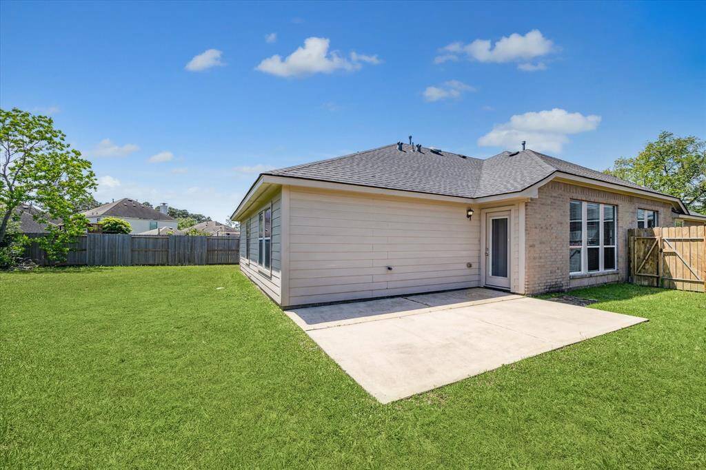 The Exterior of the Home Has Lots of Space for Grilling and Hanging Out with the Family