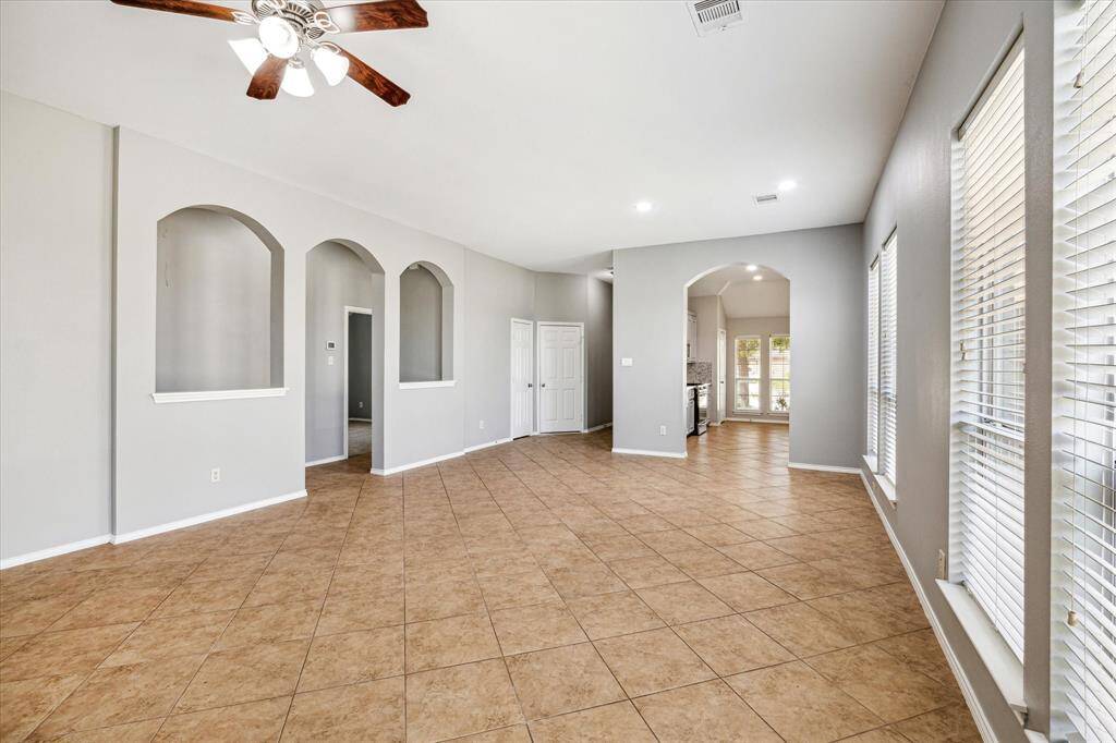 View from the Family Room in to the Dining Area and Semi-Private Kitchen