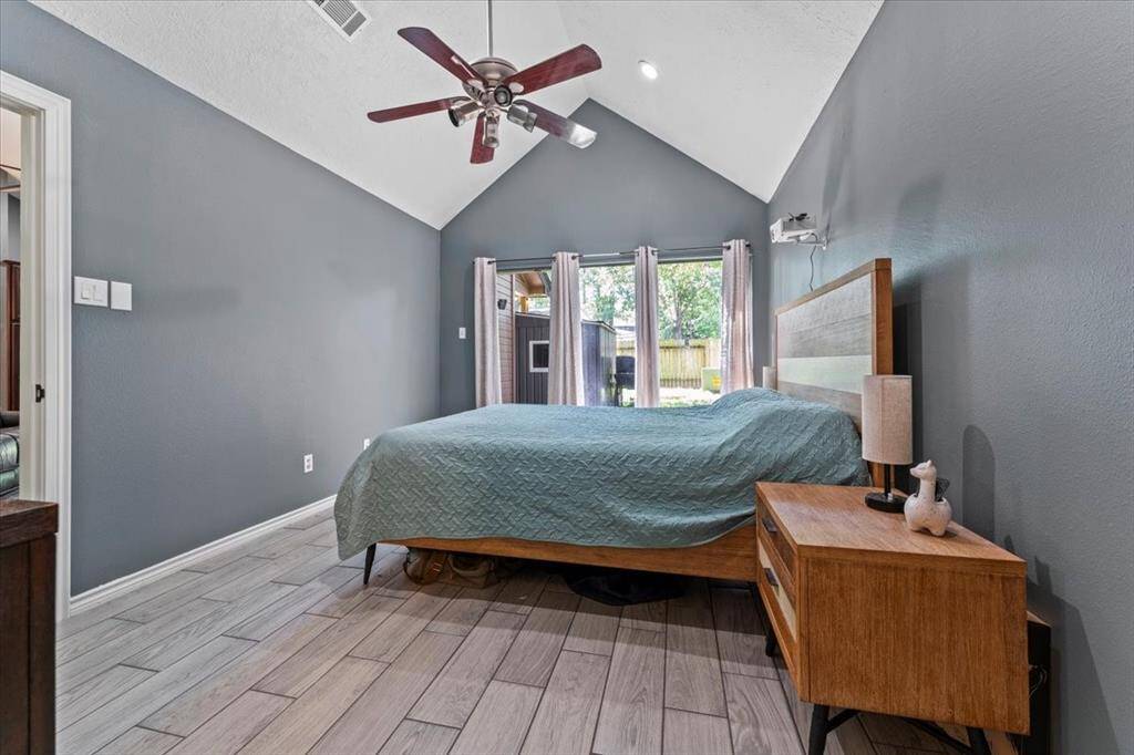 View of primary bedroom from bathroom