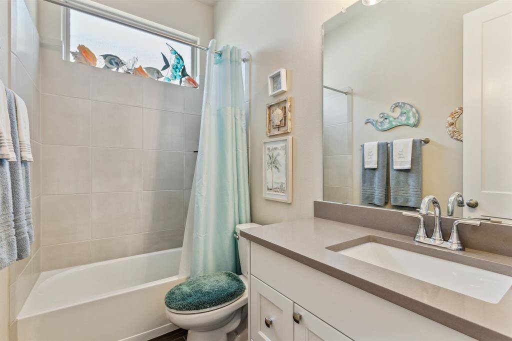 Guest bath 1 is located between Guest Bedroom 1 & 2