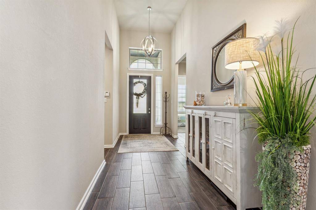Beautiful open Foyer with 8' Entry Door as well as throughout the home