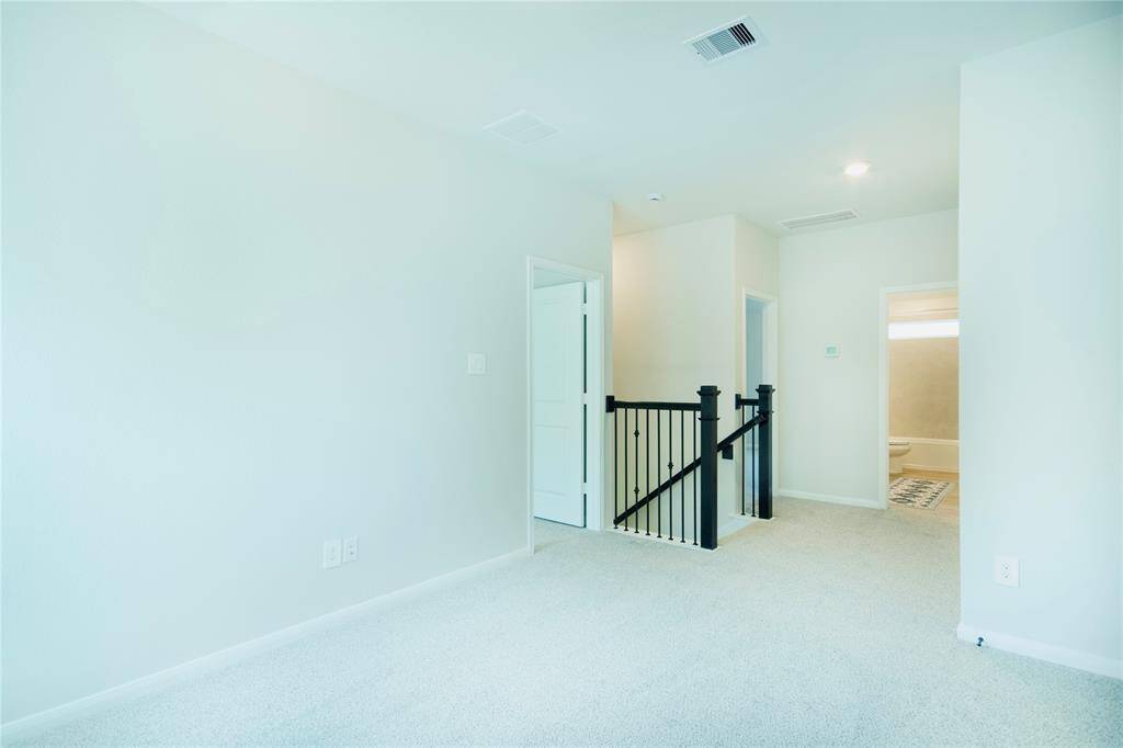 Upstairs Family Room/ Playroom. Could also be another Office if needed