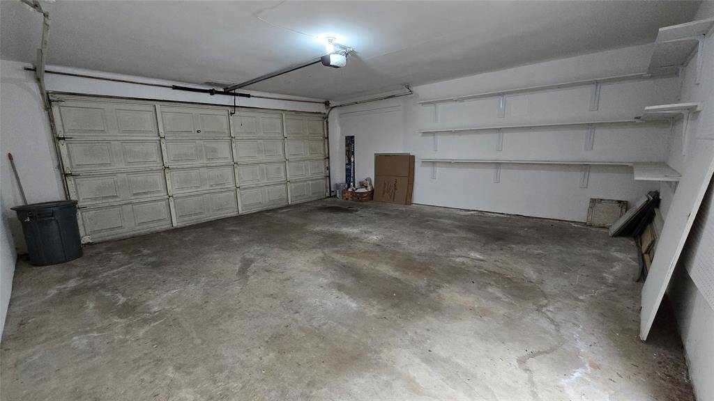 Garage: Rare for the area, this attached garage offers secure, covered parking with additional storage space.