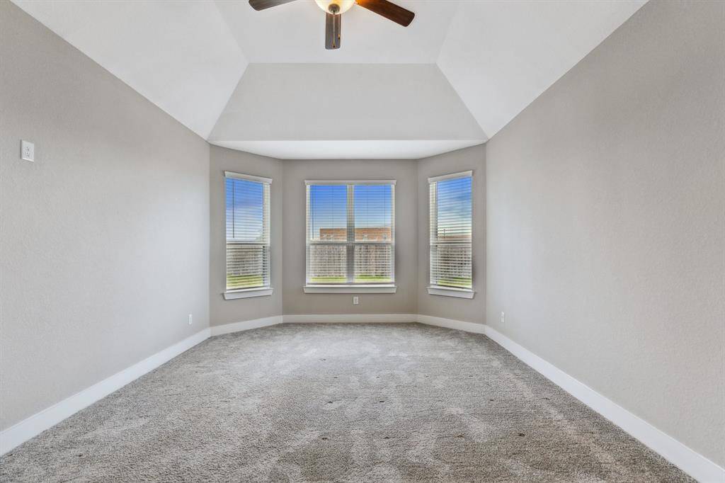 Huge primary suite is located on the first floor and offers a bay window, high ceilings, and a stunning primary bathroom and oversized primary closet.