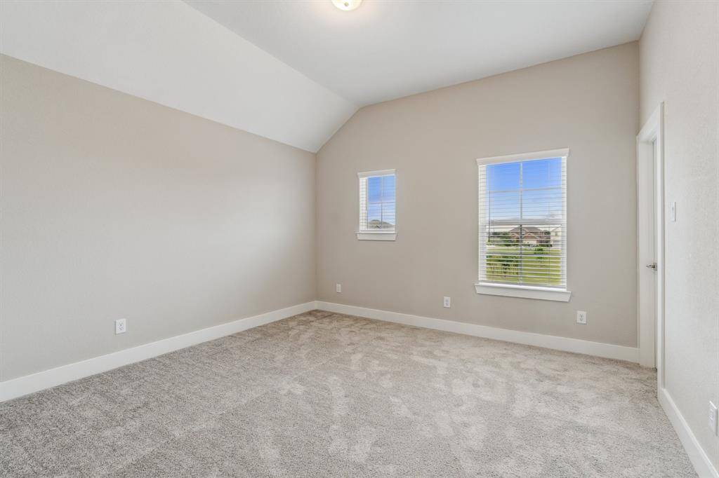 One of three large upstairs bedrooms