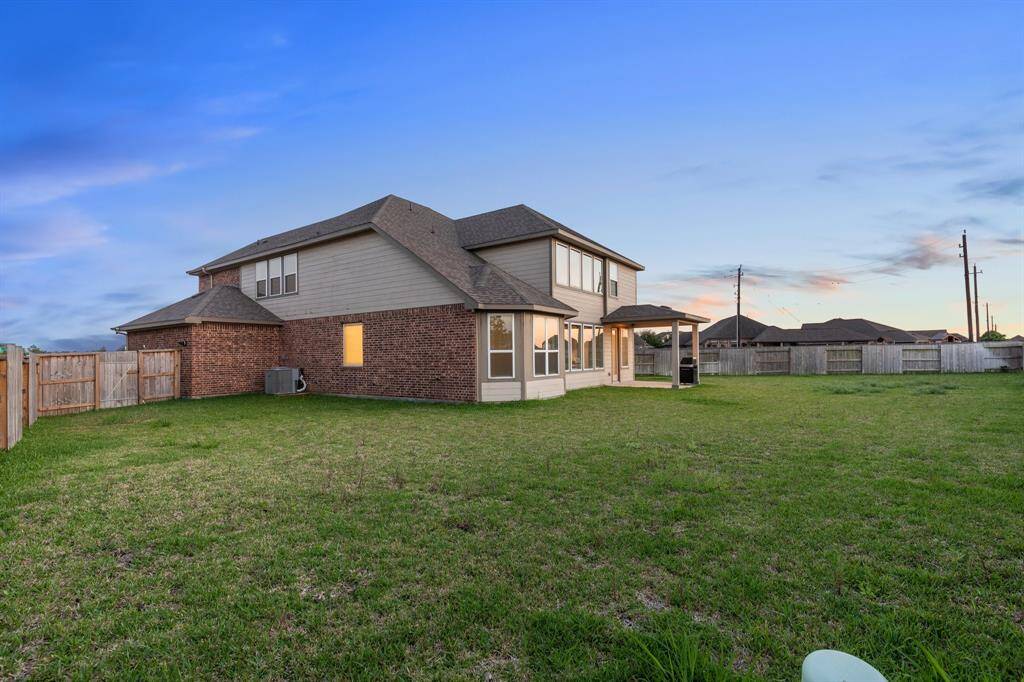 This backyard is a rare find in this neighborhood! The lot size is 11,532 square feet and the backyard is complete with a covered patio and more than enough space for a future pool!