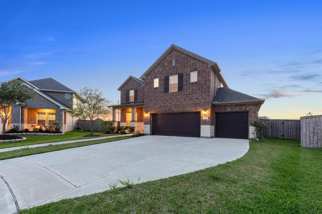 The three car garage and extra wide driveway make parking a breeze at this home