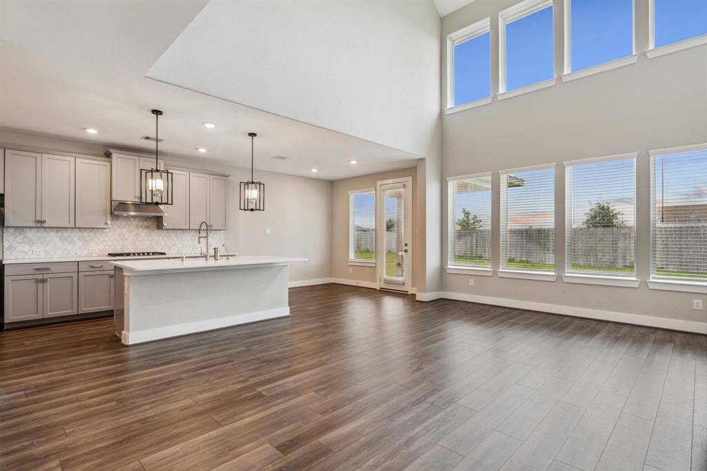 Walls of windows let the natural light pour into this stunning home!