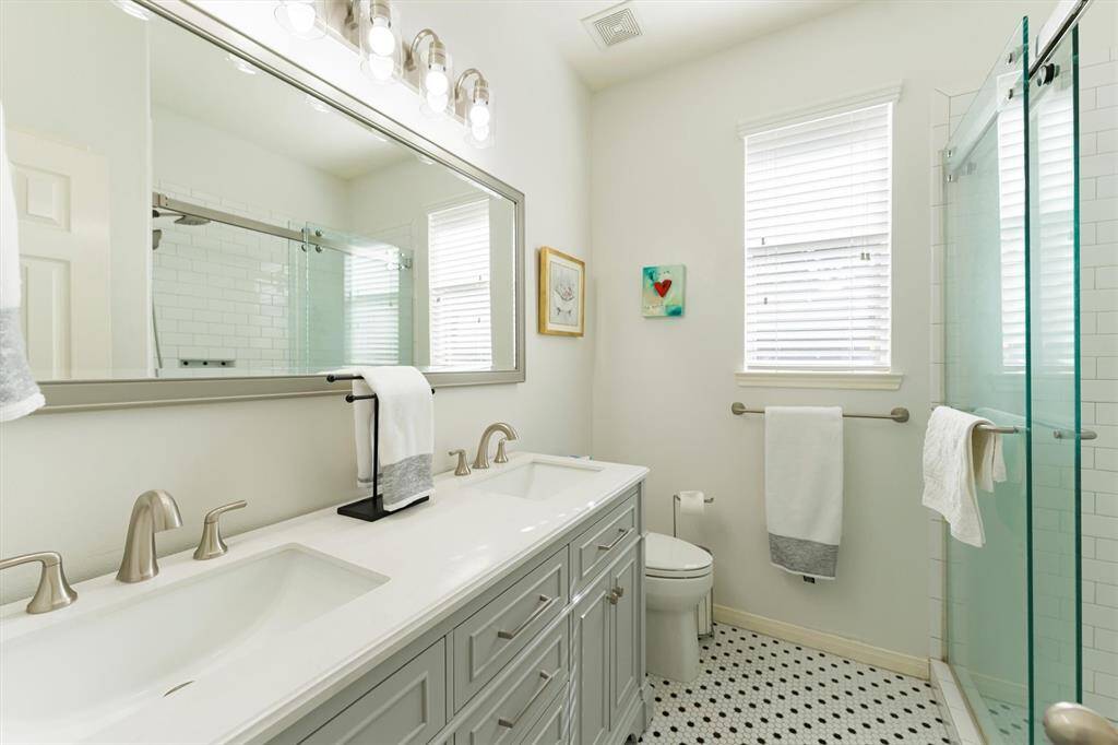 2nd Full Bath down with walk in shower... Recently remodeled...