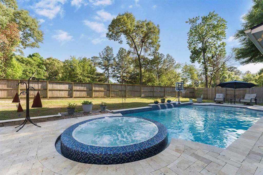 A Breathtaking Outside Paradise to enjoy 365 days a year.  Pool & Jacuzzi are heated...