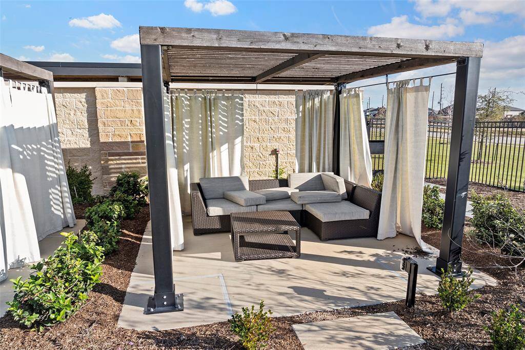 Private cabanas with shaded pergolas and outdoor seating offer the perfect escape for poolside lounging, afternoon reading, or relaxed conversation in a resort-inspired setting.