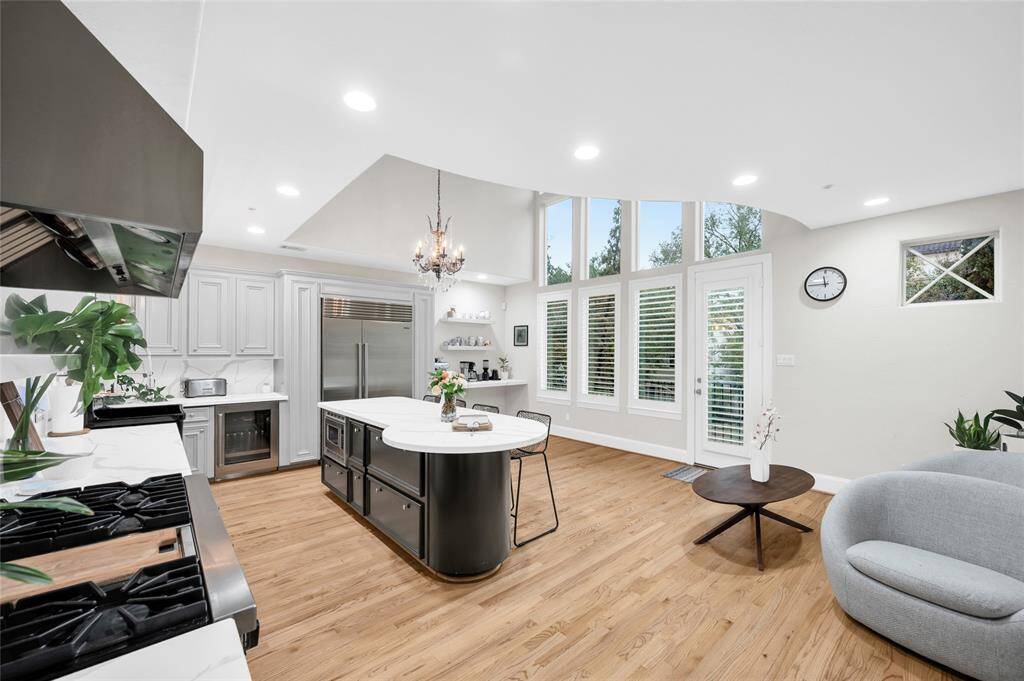 This renovated kitchen will be the heart of the home, with plenty of space for culinary adventures, large scale entertaining, breakfast table, sitting area, and coffee station to the right of the fridge. Special amenities include commercial grade Viking range, new Sub-Zero fridge/freezer and wine fridge, quartzite countertops, pretty windows and access to the balcony. There is also a large, walk-in pantry with deep shelves for storing food and kitchen accessories. A true treasure of a kitchen!