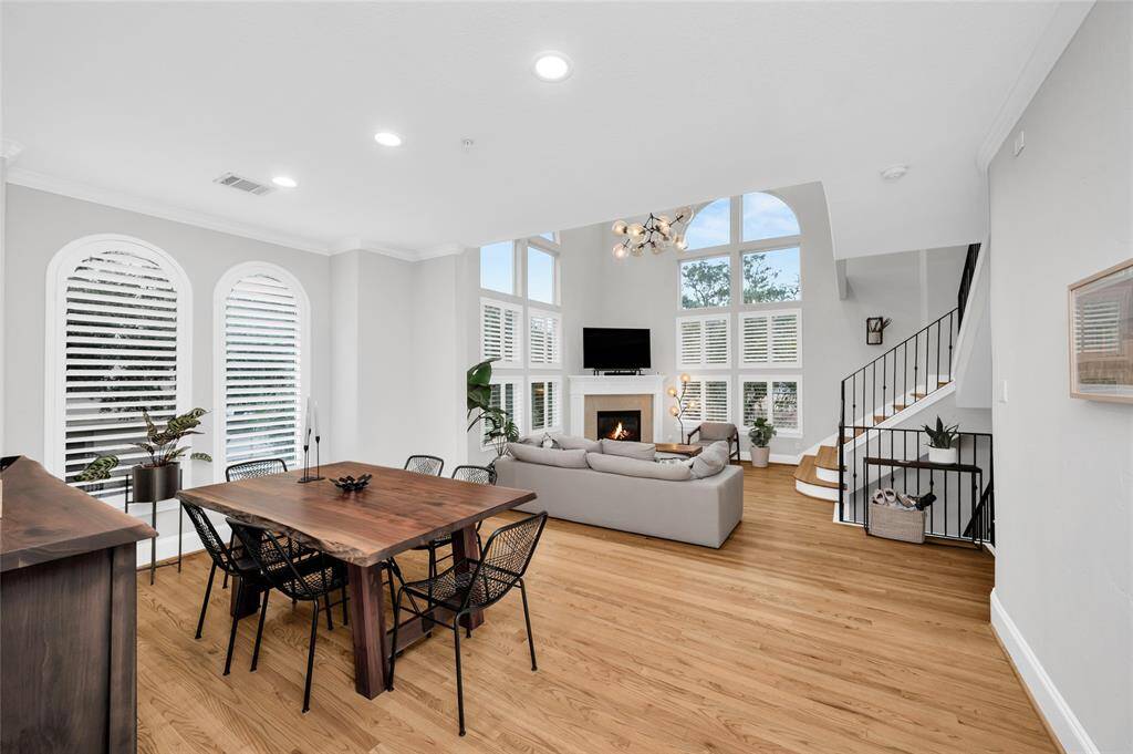 The formal dining room, just off the kitchen, flows very easily to the large, light-filled living room.