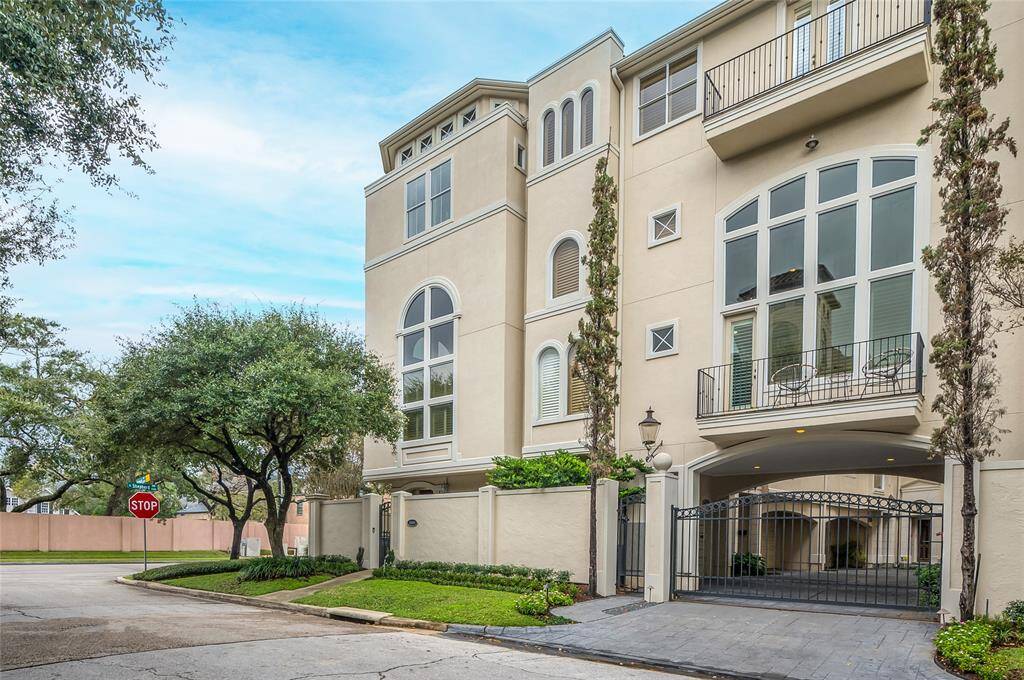 This angle of 2094 Brentwood showcases the balconies off the primary suite and kitchen- wonderful spaces to relax and unwind!