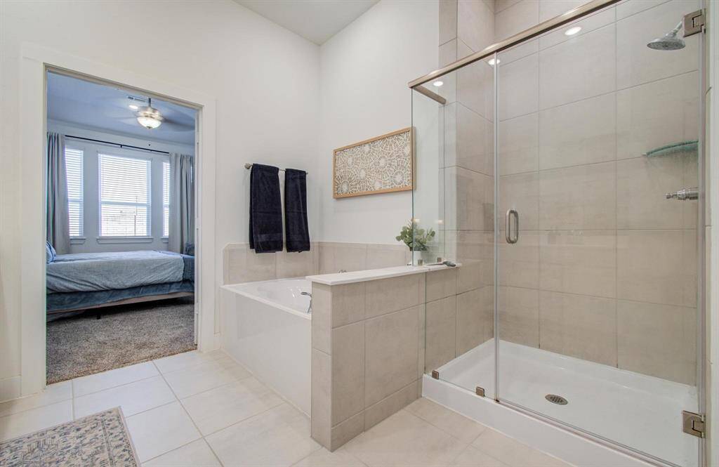 Another view of the oversized walk in shower and soaking tub. Take your pick! You will love relaxing in here.