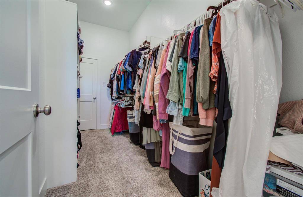 One of my favorite features is this HUGE walk-in primary closet with built-in shelving. It's the perfect place for you to store anything you need and the best part... click to find out!