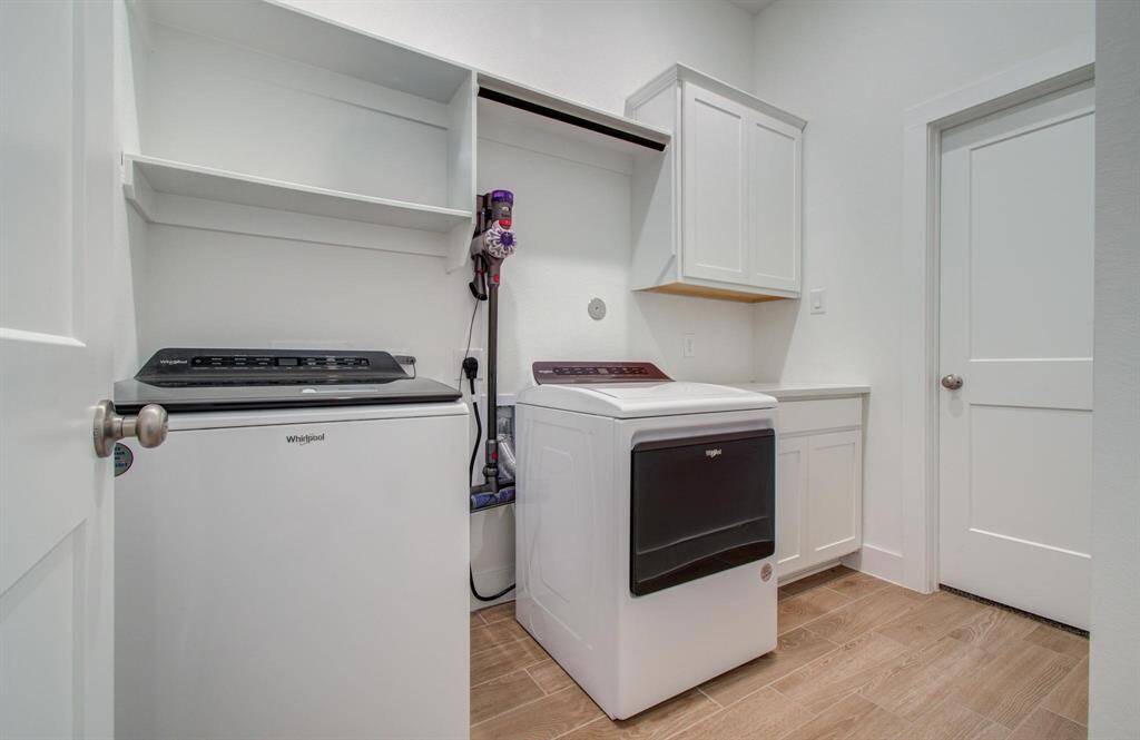 he closet connects to the laundry room! This makes laundry day so much easier. This laundry room is a great size with storage cabinets and even a sink! This home has so many upgrades that area already included for you.
