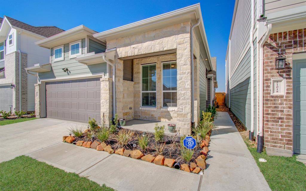 A welcoming front porch greets you and is a great place to sit and enjoy the cooler weather.