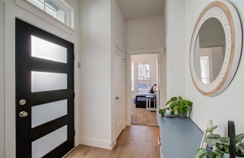 Entry is perfect for a table and "drop" spot. You will love the neutral colors in this home... you can move right in.
