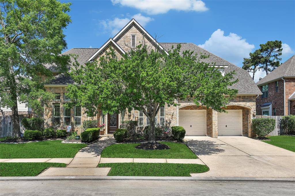 2103 Chelsea Creek Ln - 4,238sf, 4/3.1/3 w gameroom, both formals, media room, and more!