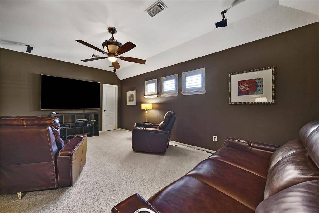 Enjoy movie night with the family or watch the big game in your theatre room.