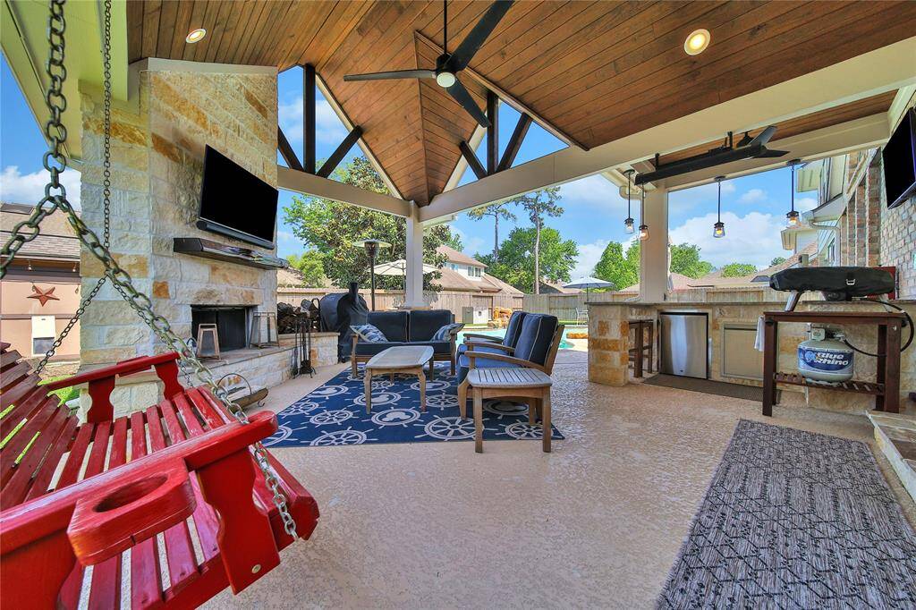 Enjoy morning coffee here or invite friends for a cookout. This space is an entertainer's dream.