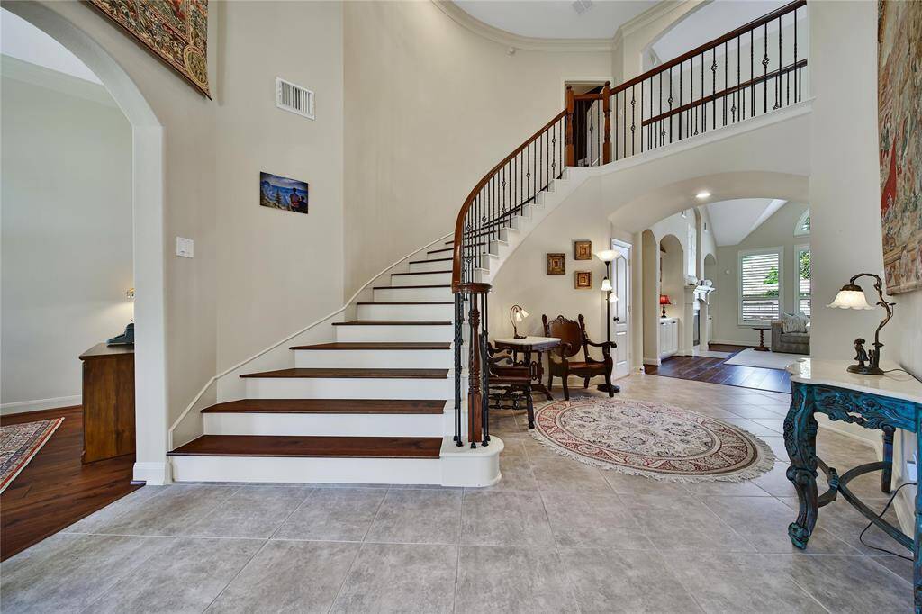 Beautiful cascading stairs with upgraded wood treads.