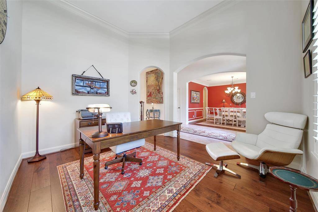 Both the formal flex space and formal dining room compliment the beautiful foyer.