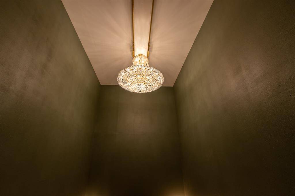 Beautiful chandelier in exterior hallway