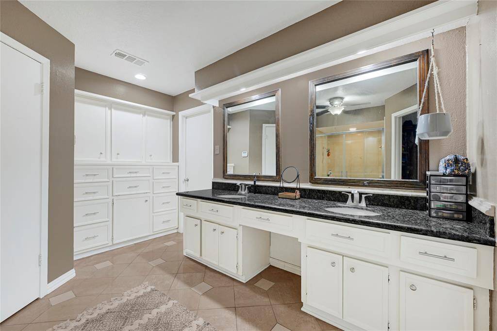 Primary bathroom double vanity sinks