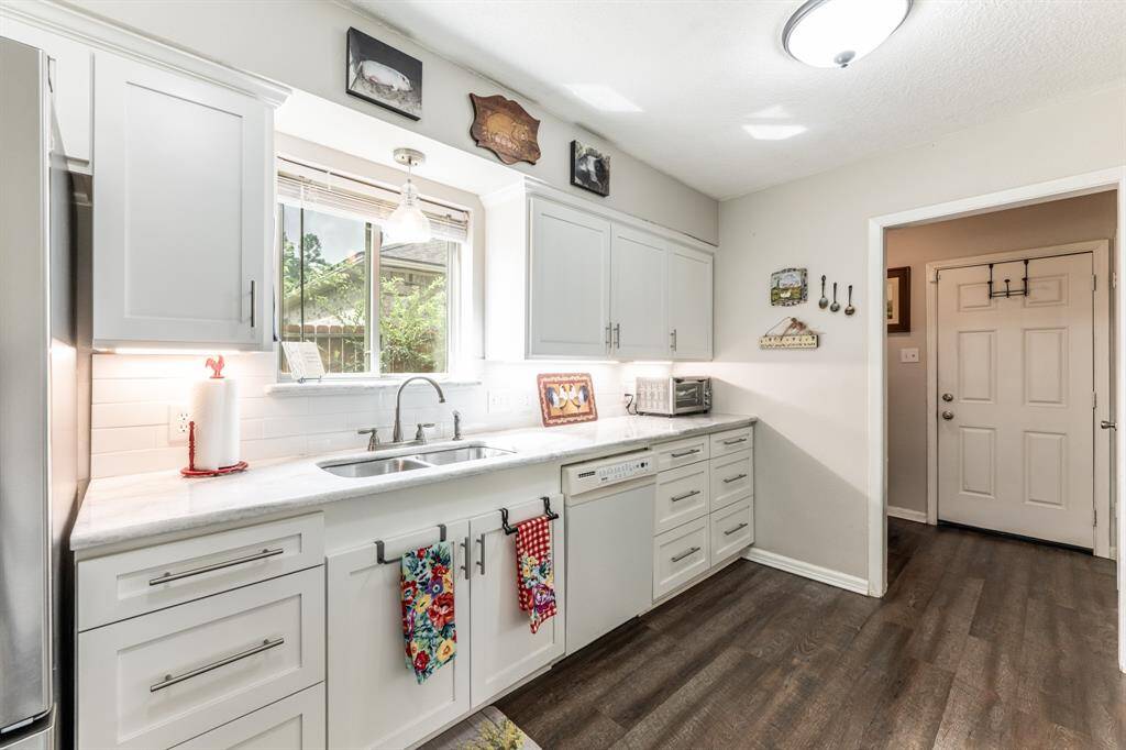 Recently updated kitchen with quartz counters and SS appliances