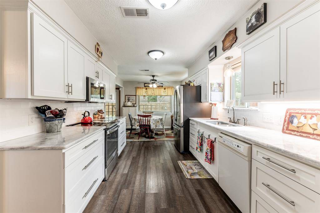 Recently updated kitchen with quartz counters and SS appliances
