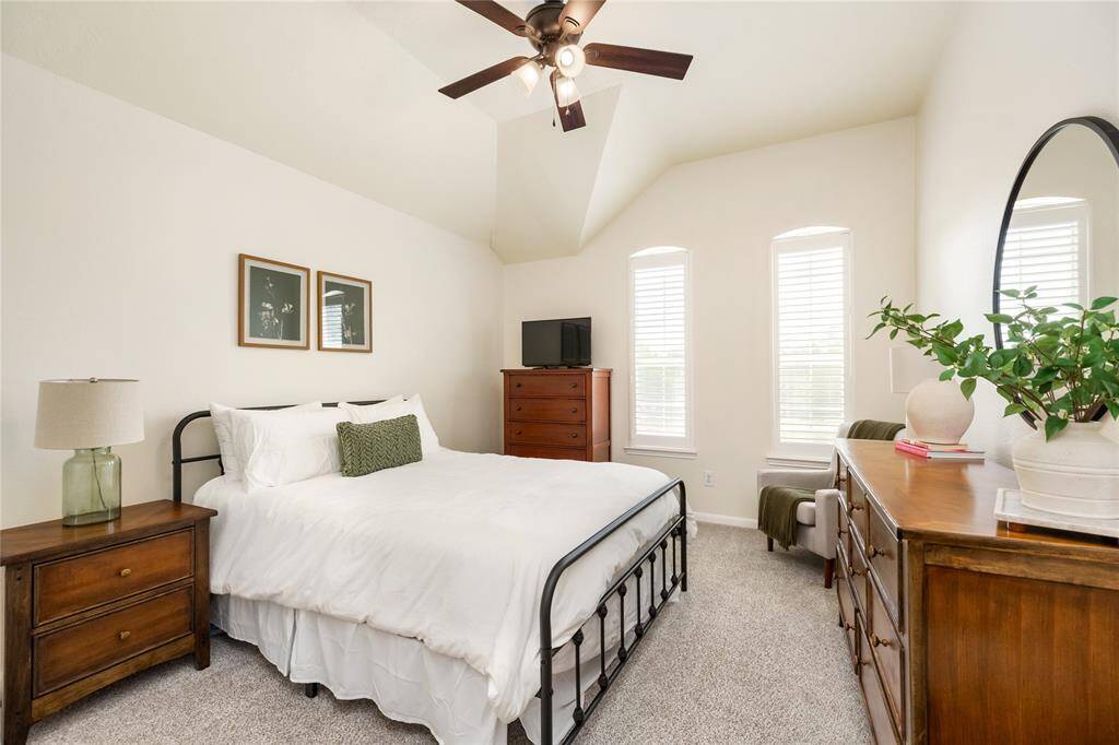 Each of the secondary bedrooms offers a bright and welcoming atmosphere, thanks to large windows that fill the rooms with an abundance of natural light. With ceiling fans for added comfort and spacious closets for all your storage needs, these rooms provide a perfect blend of style and practicality. Ample space ensures everyone enjoys their own comfortable retreat.