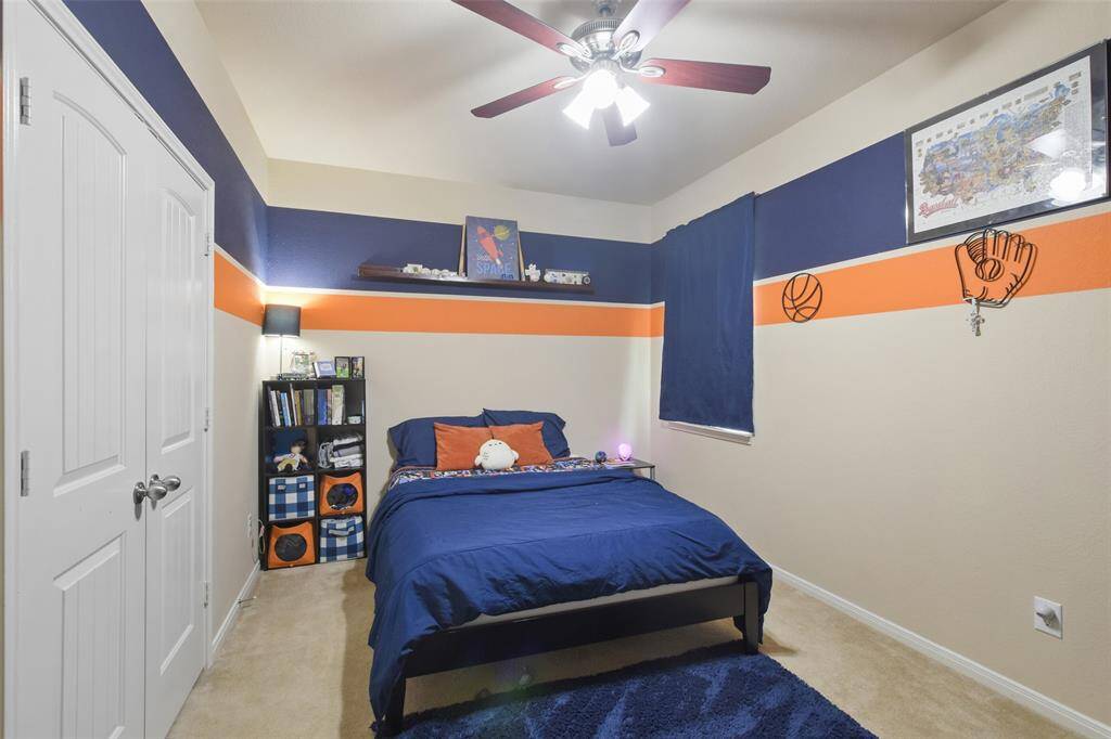 Secondary bedroom with walk in closet